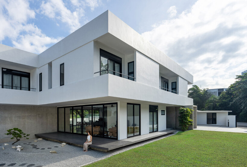 vast shuttered wall blurs thresholds at fabian tan's concrete house in kuala lumpur 