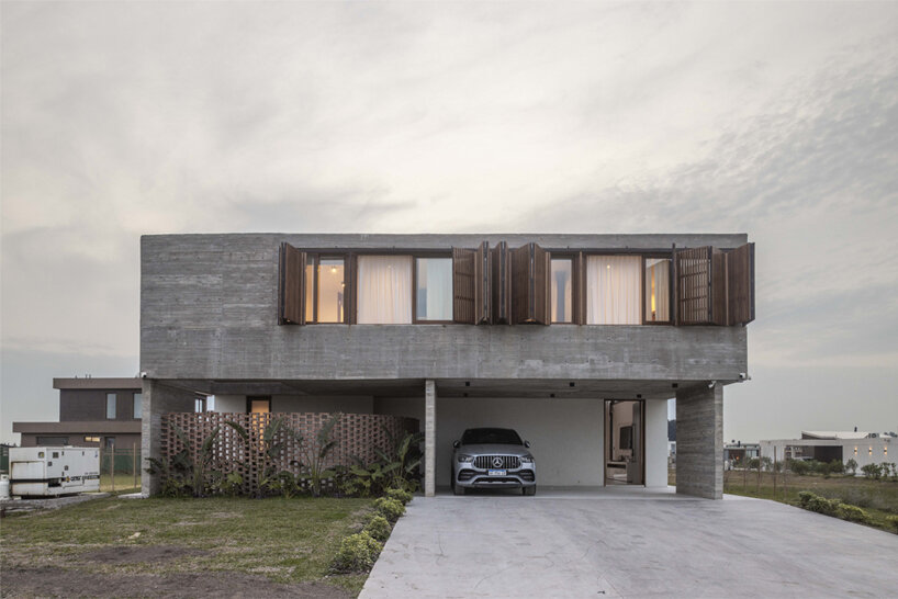 the project combines the warmth and functionality required for family living, creating an inviting home