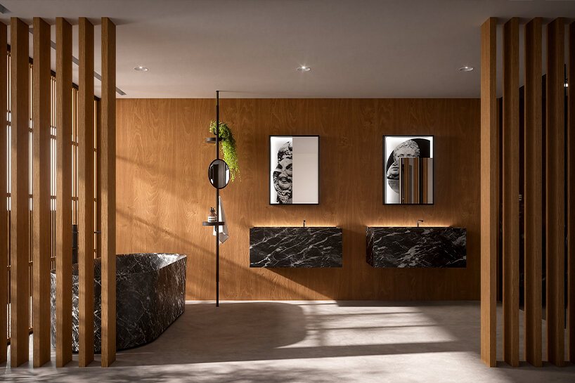 en-suite bathroom on the first floor with FILORIGO washbasin by Paolo Ulian and the ORION bathtub by Mario Ferrarini