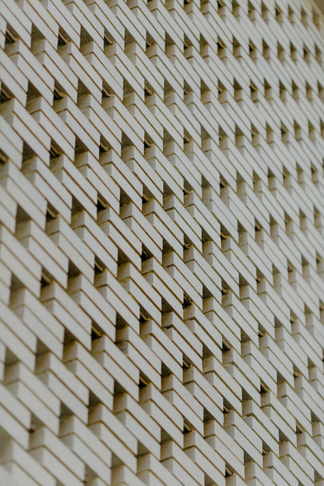 simple repetition of the modular brick screen creates a dynamic visual pattern