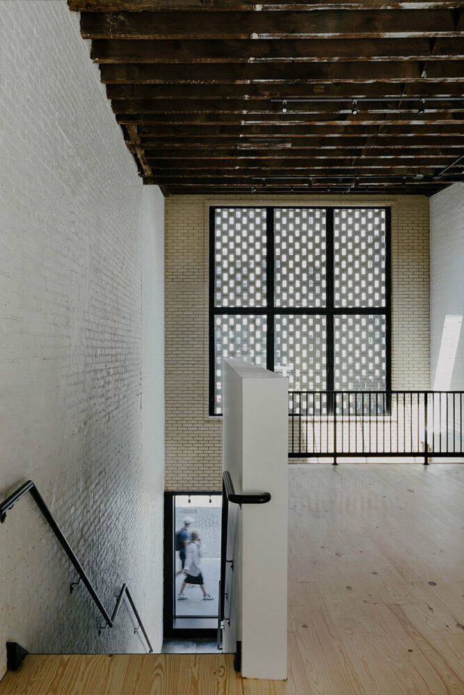 the exposed joist ceiling reveals the history of the structure
