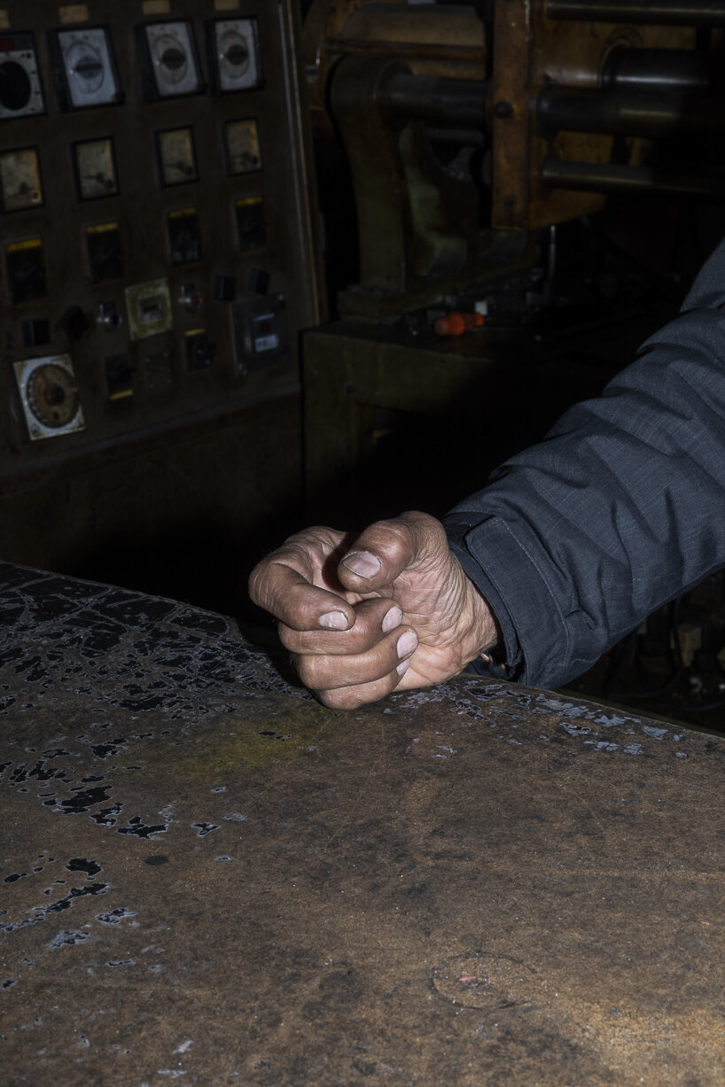 in the basement, the Turkish artist sets up a room where a functioning machine processes raw material