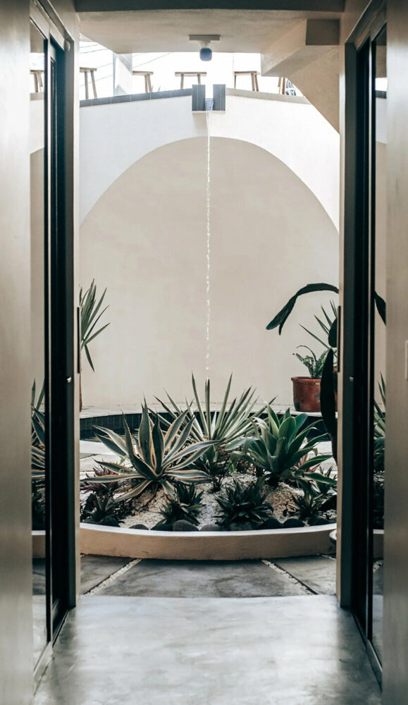 enhancing light and ventilation. the courtyard ensures privacy