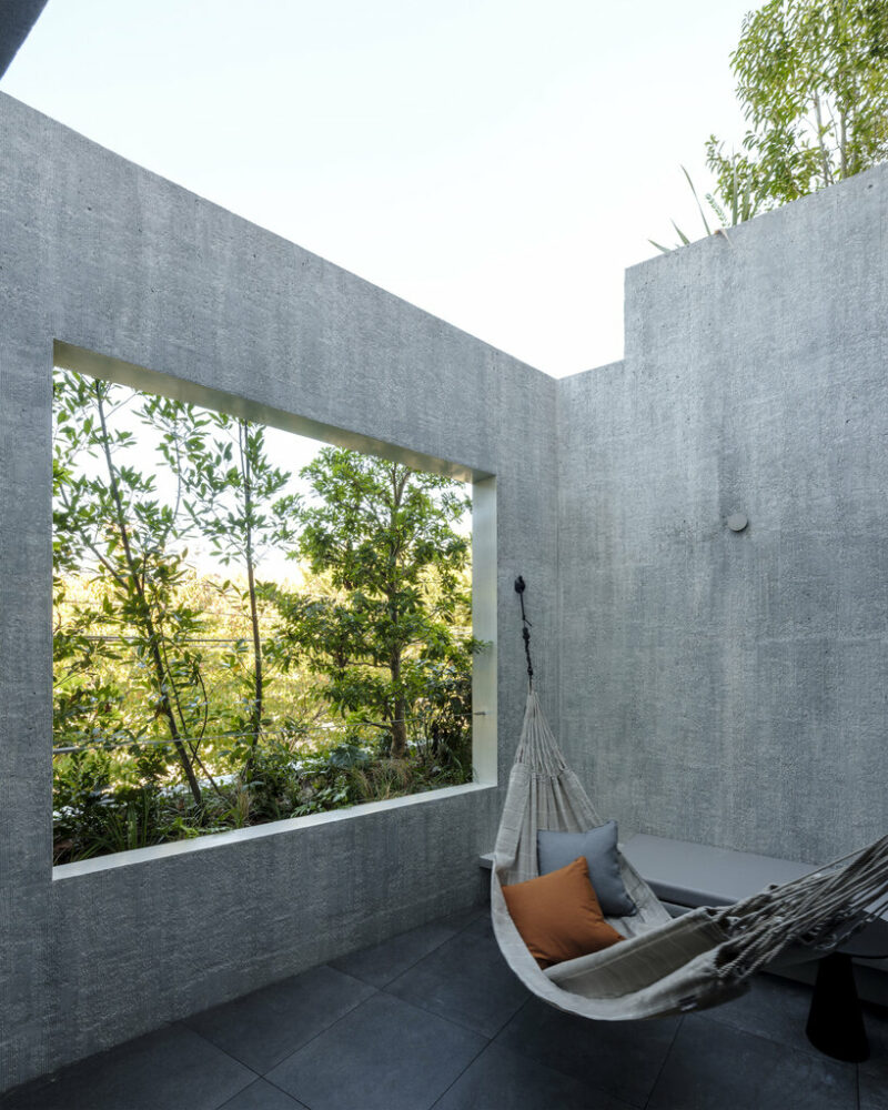 the terrace is designed to preserve privacy while remaining open to the natural surroundings