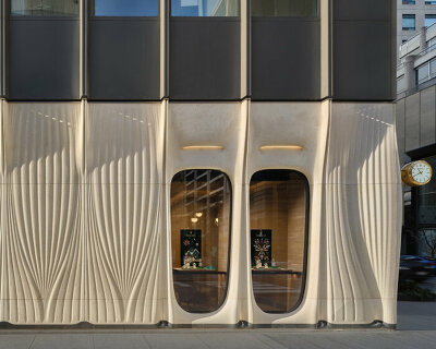 partisans sculpts arches into limestone at toronto's royal de versailles rolex boutique