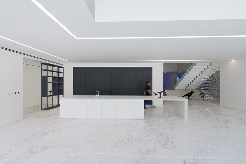 the all-white interior creates a serene ambiance