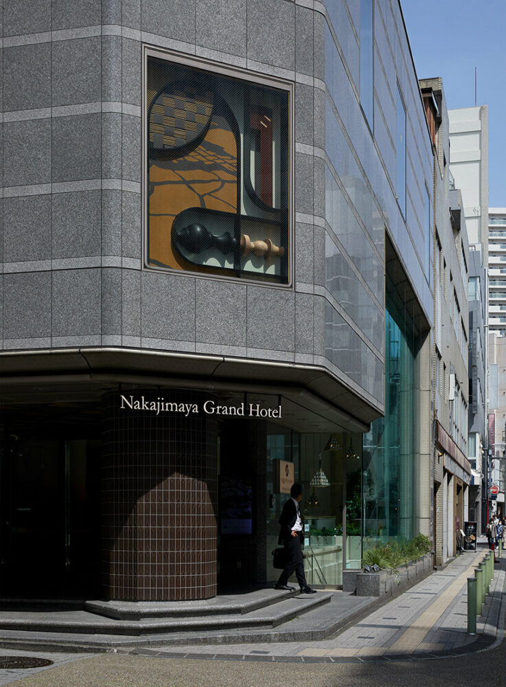 the Nakajimaya Crossing monument serves as a decorative centerpiece