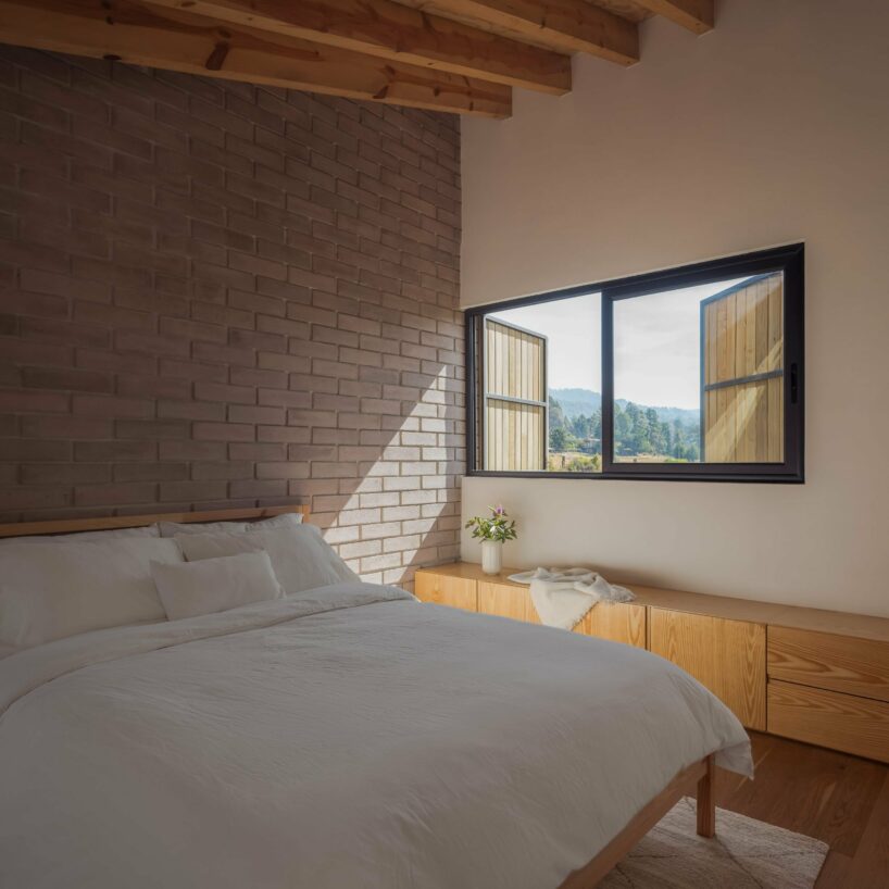 the bedrooms on the upper level benefit from the height given by the geometry