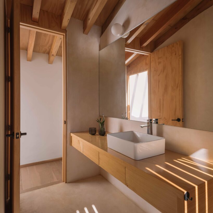 the bathrooms are simple and functional, like the rest of the house