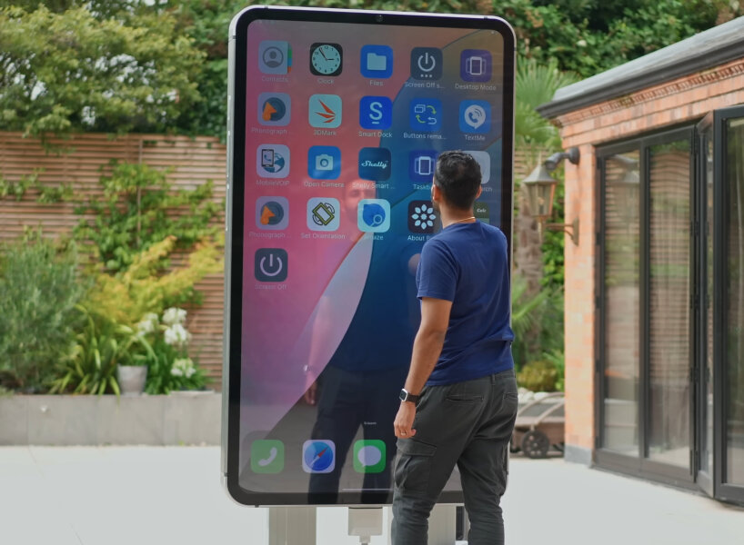 the largest smarphone replica stands over two meters tall and needs its own stand to be on its feet