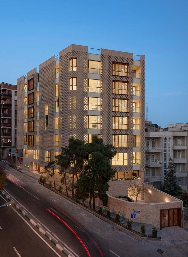 respecting its urban surroundings, the Zendegi Building, with its modest scale and natural materials, blends into the area