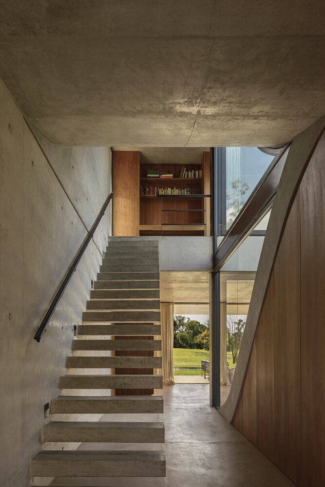 concrete, wood, iron, and glass in their raw forms reinforce the connection to nature