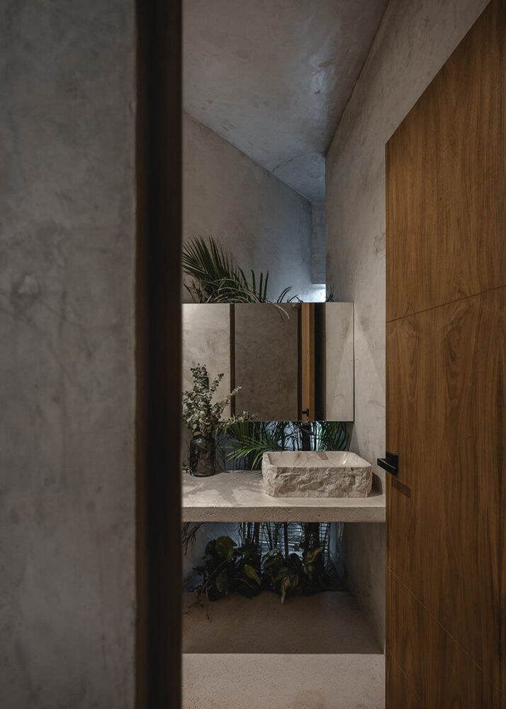 Casa Zen’s black-framed windows contrast against the polished white cement floors