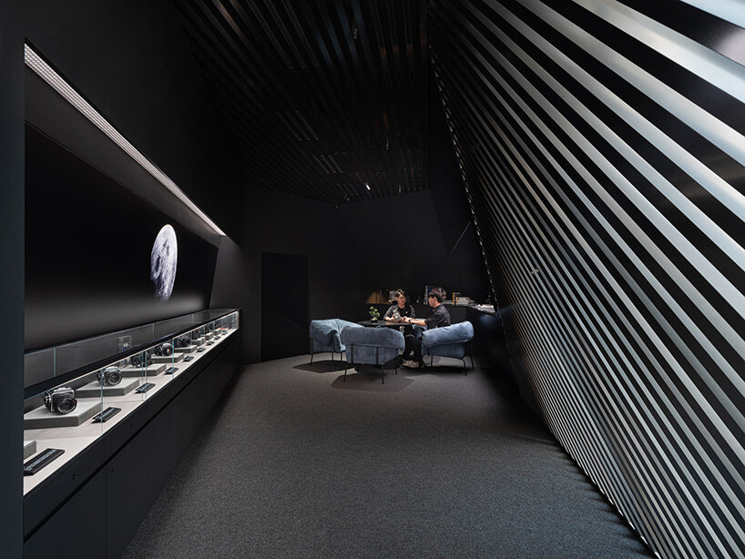 despite the limited ceiling height, the design team concealed equipment like air outlets and speakers