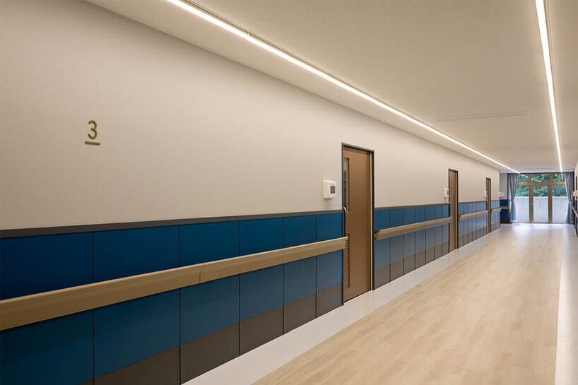 deeply carved wooden ceilings dispel the sterile feel of healthcare environments