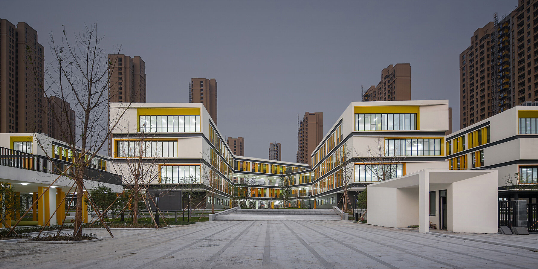 open, colorful facade by GLA design brings life to staggered school buildings in hangzhou