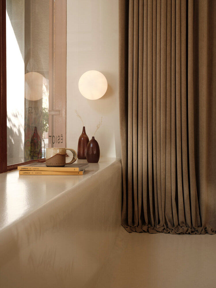 behind a curtain, the backstage area reveals the raw authenticity of the Greek footwear brand