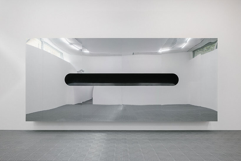 white foam envelops underground gallery in harry nuriev's debut solo show at berlin art week