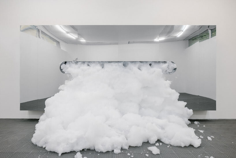white foam envelops underground gallery in harry nuriev's debut solo show at berlin art week