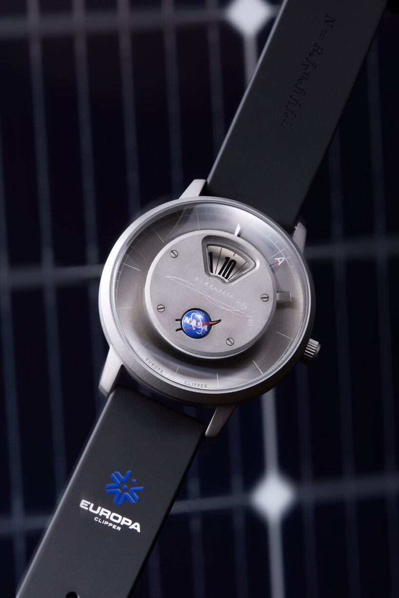 the second strap has the Europa Clipper logo as well as the engraving of the Drake Equation