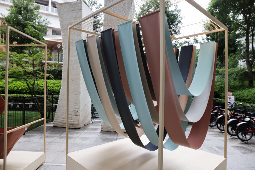 the design takes cues from the ‘elegance of kimono’ and origami | image © designboom