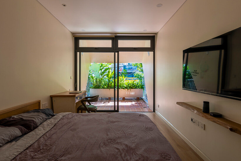 a semi-enclosed terrace offers a peaceful space shielded from noise and surrounding city views