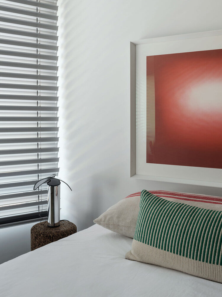 metallic drapes regulate the natural lighting in the bedroom