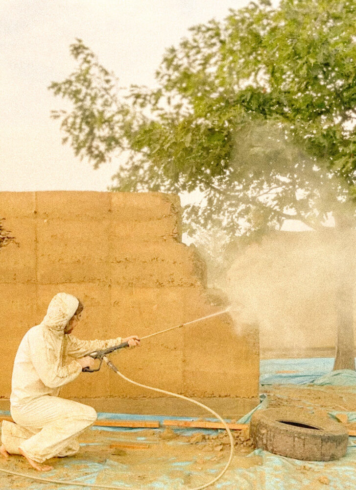 the walls were manually shaped using a high-pressure water sprayer