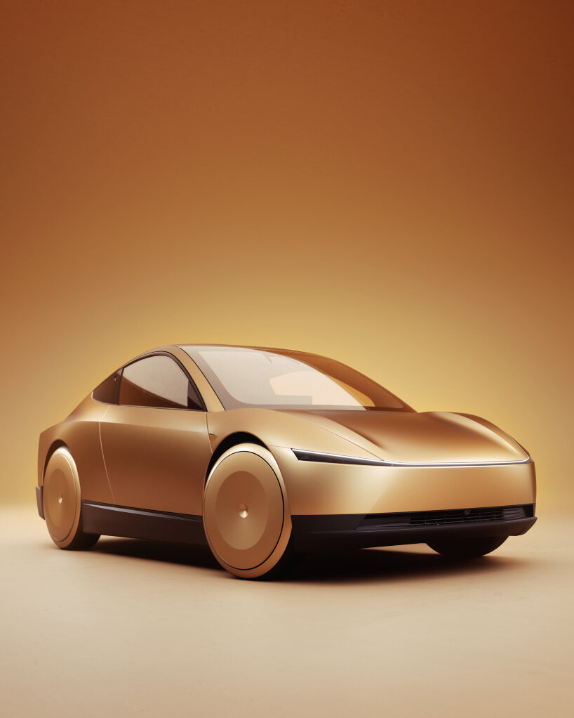 the exterior of the Tesla Robotaxi looks uniform with a metallic, gold-like shade
