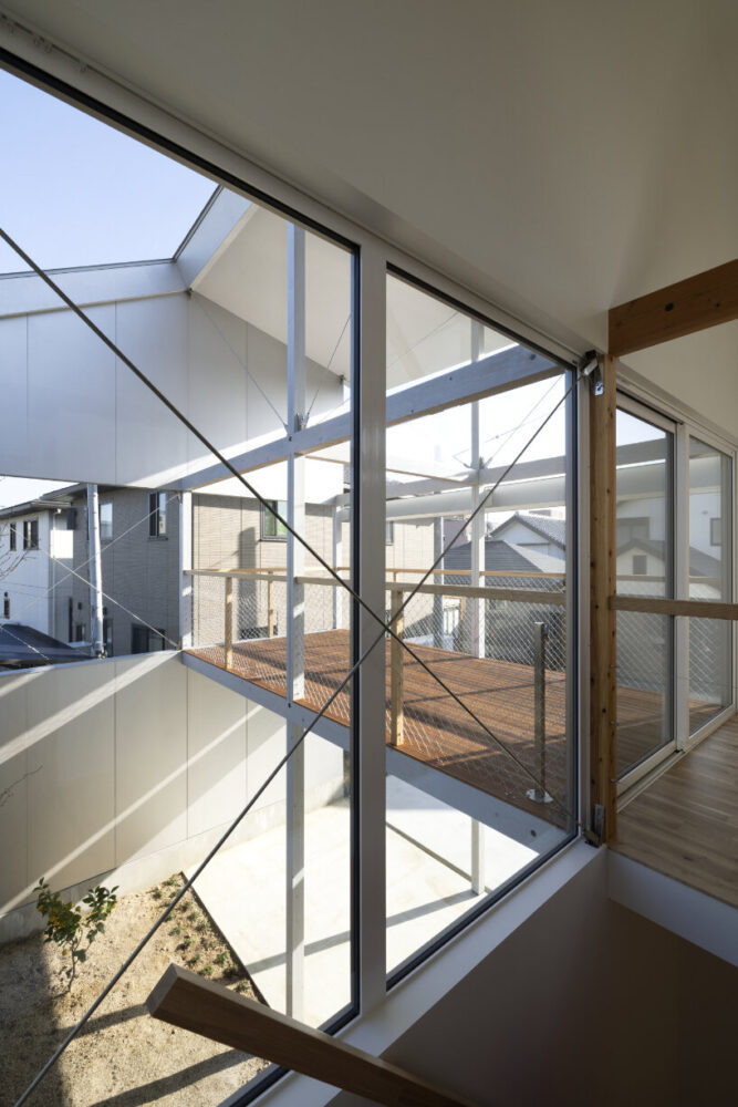 the architects elevate the main living areas to the upper floors