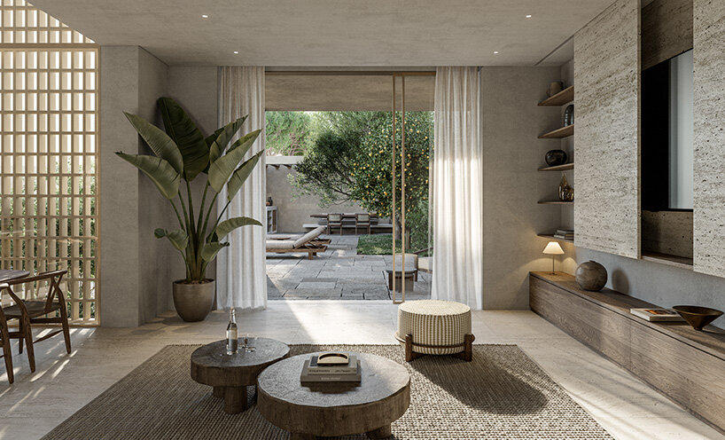 large windows draw sunlight inside and offer views of the gardens