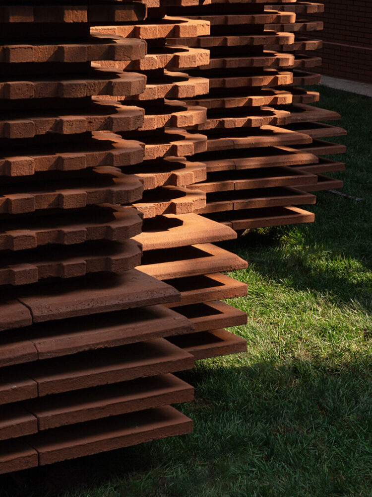 each brick is carved and stacked to reflect a sense of heritage