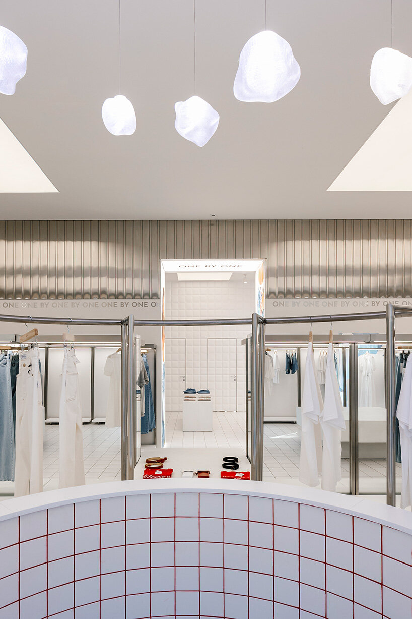 the showroom’s soothing blue palette creates a calm shopping atmosphere
