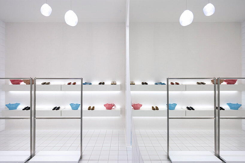 a light-filled interior serves as a clean backdrop for One by One’s fashion displays
