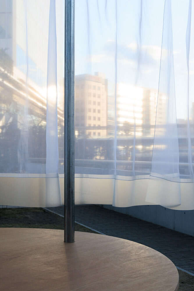 natural elements constantly transform the appearance of the organdie curtains