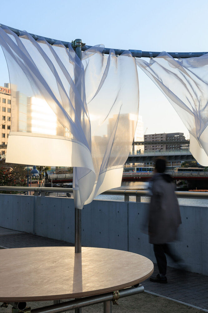 throughout the day, sunlight changes the curtains’ opacity