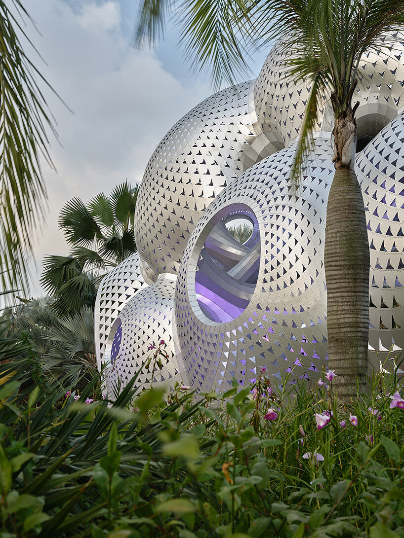 his aluminum structure has room for two cars and drive-through access