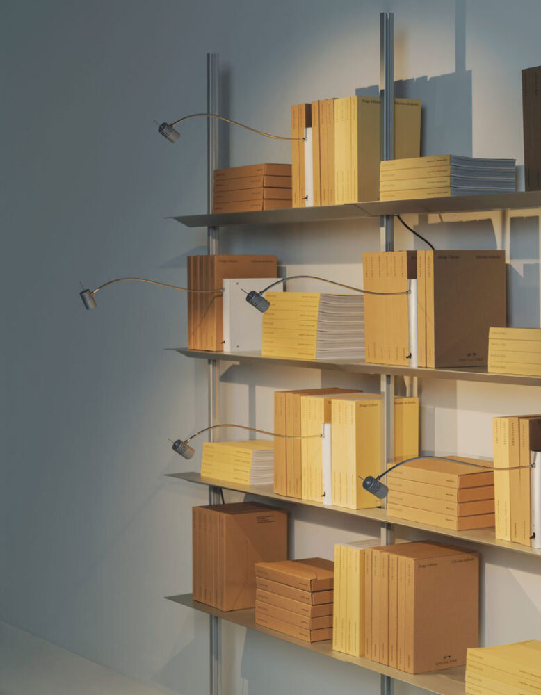 shaped like a book, oscar tusquets' bib luz lamp discreetly integrates into any shelf - 5