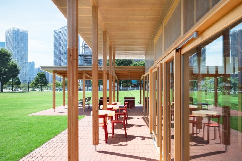 cluster of intimate wooden huts shape schemata architects’ blue bottle café in tokyo park