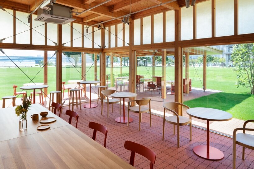 cluster of intimate wooden huts shape schemata architects’ blue bottle café in tokyo park