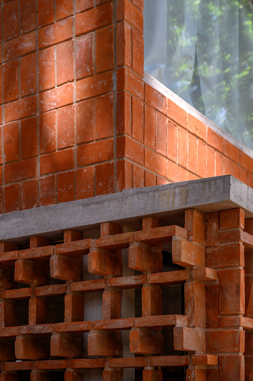 the residence integrates with the pine forest