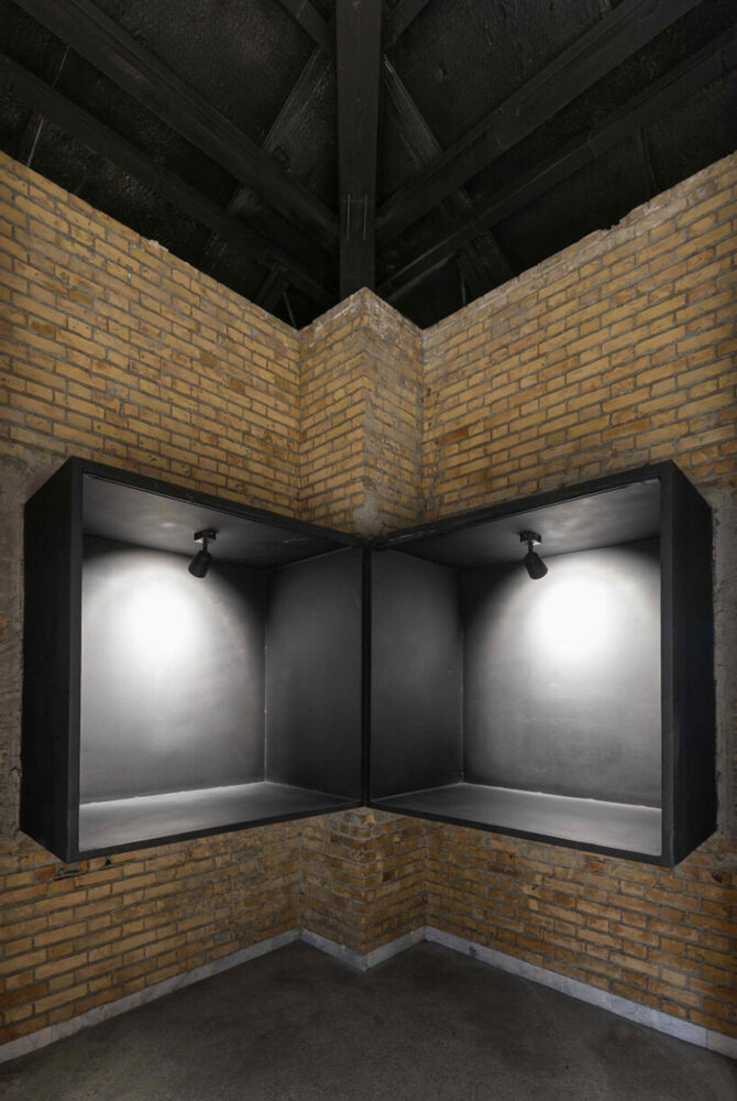 the central cubic space is framed by these openings