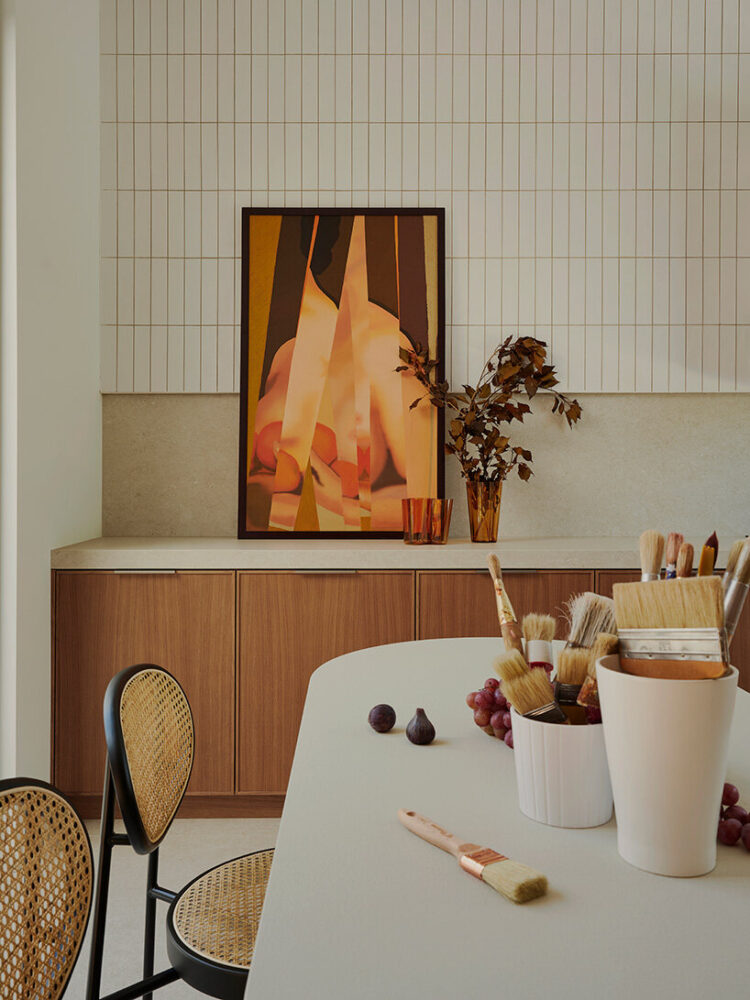 upholstery in terracotta and neutral tones creates a tactile warmth