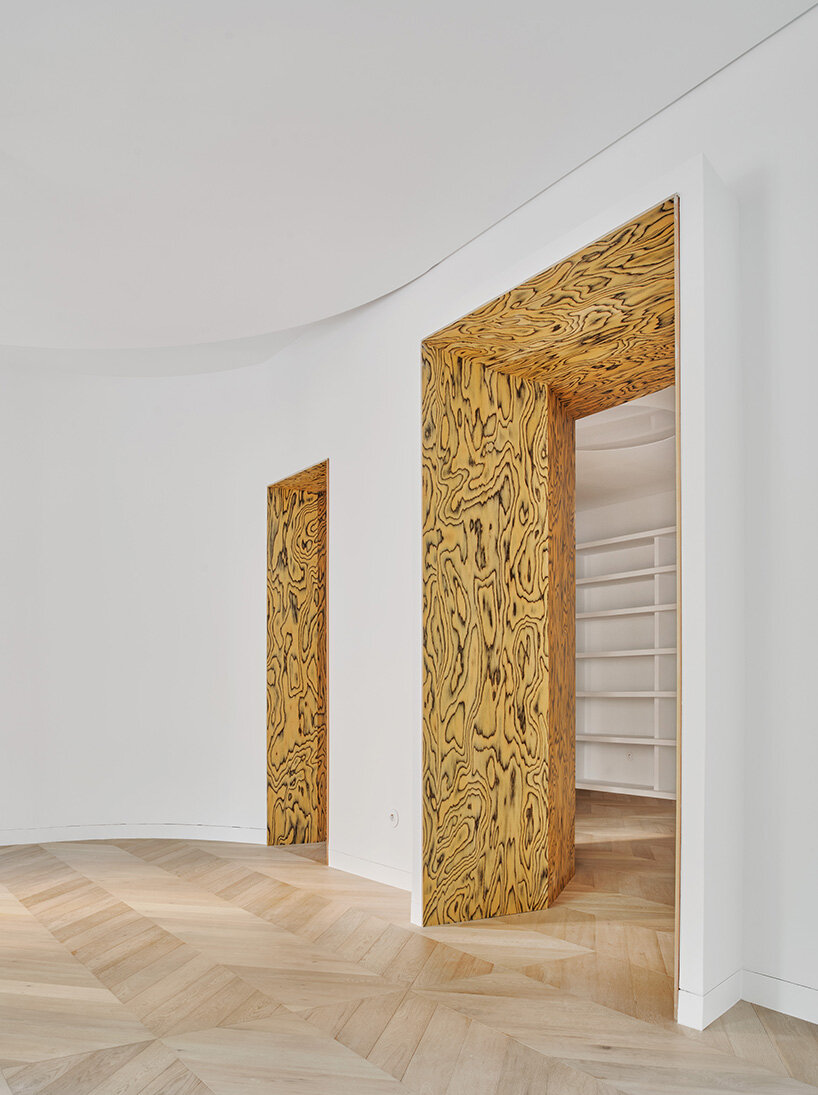 classic wooden floors and traditional joinery coexist with modern textures