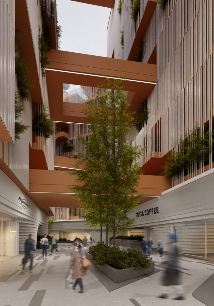 the open passage and inner courtyards allow for ventilation and contrast with the surrounding enclosed development