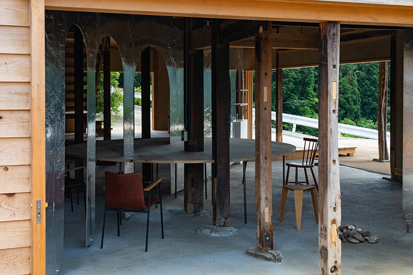 coniferous forests giving way to sunny spaces framed by the plum groves along the road