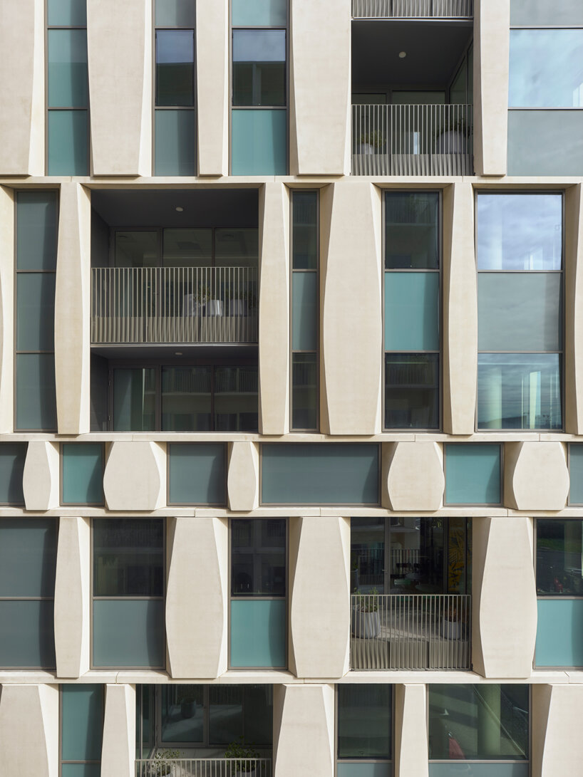 a layered perimeter skin alternates ribbon window bands with opaque panels