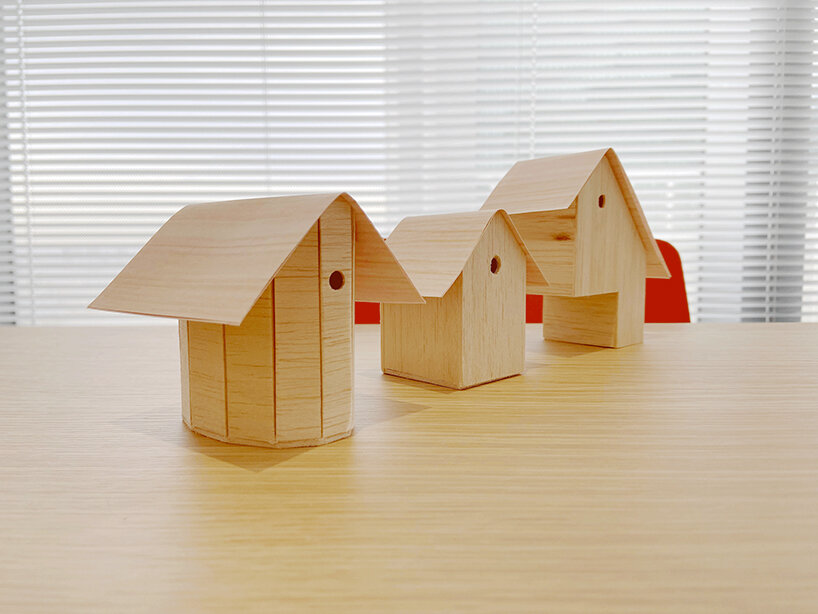 model study with a common thin plywood roof and a massive wooden room