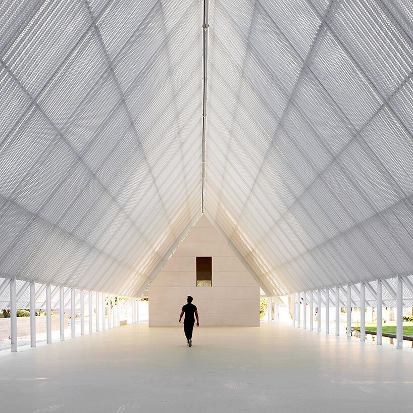 the base rises to form an abstract structure resembling a silent monument | image by Sanif