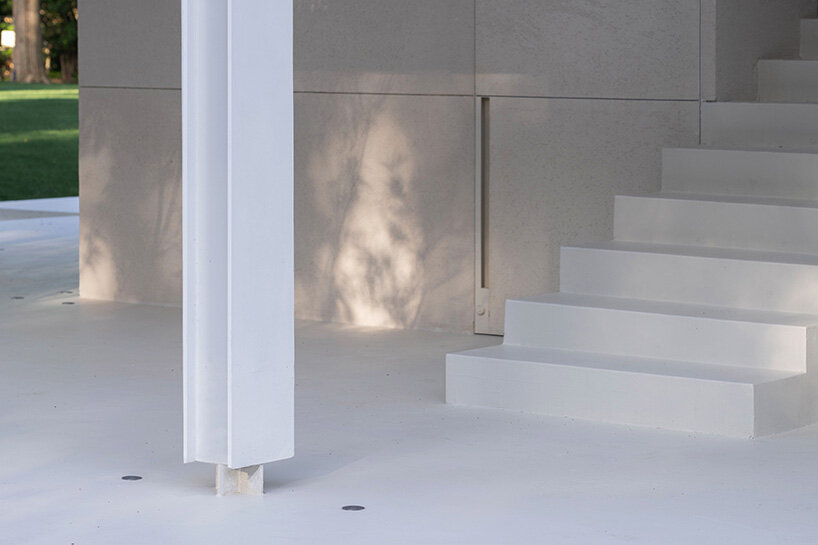 a canyon-like staircase leads to elevated platforms that frame moments of the park | image by DONG Image